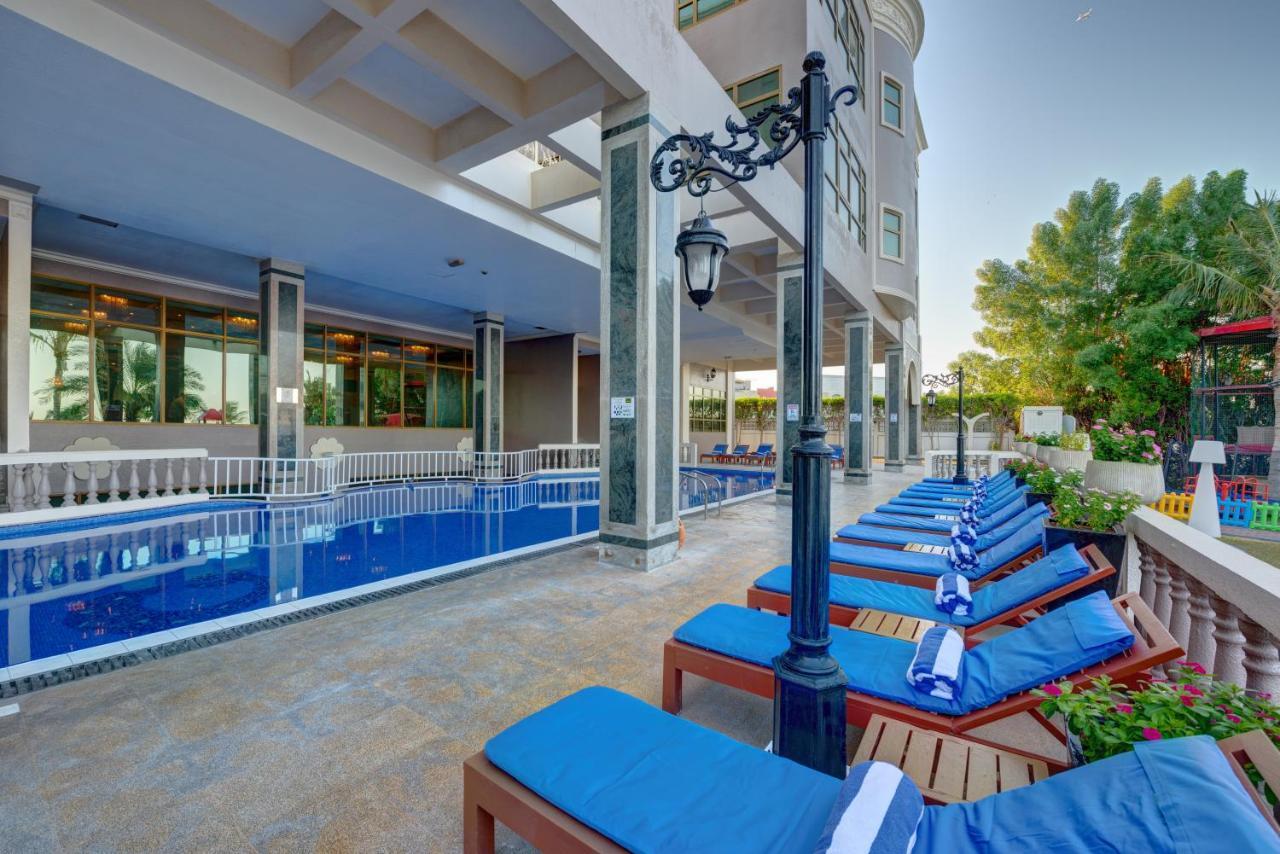 Sahara Beach Resort & Spa Sharjah Exterior photo The pool at the hotel